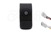 E-Scooter Beschleuniger mit schwarzem Startknopf